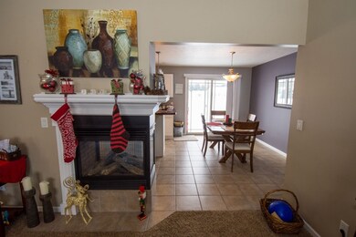 Living room with dual sided fireplace