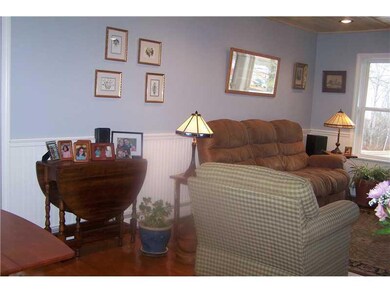 Exterior Front. Living room angle