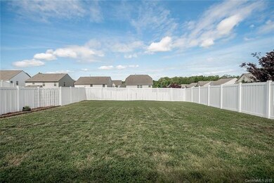 Large, flat, fenced backyard with lots of privacy.