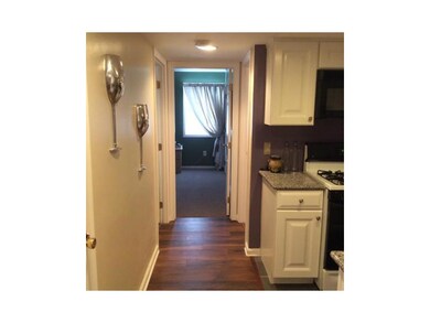 Other. View from kitchen to hall to bedrooms.