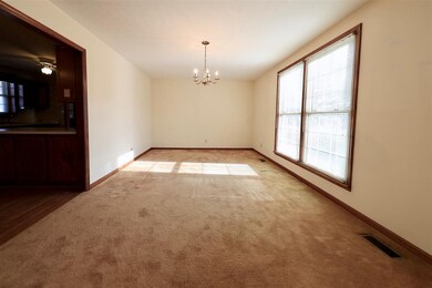 The large dining room opens to the kitchen and liv