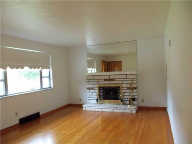 Living Room. Hardwood Floors and Plaster Walls Thr