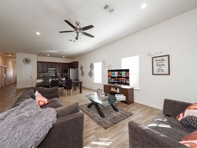 Living room featuring light hardwood / wood-style 