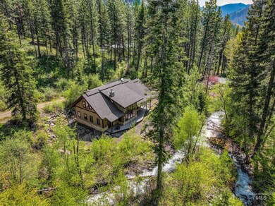 View of subject property featuring a heavily wooded area