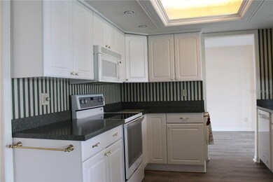 Newer Appliances, Countertops, Cabinets, Lighting.