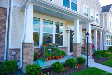 Charming landscaped front porch area with beautifu