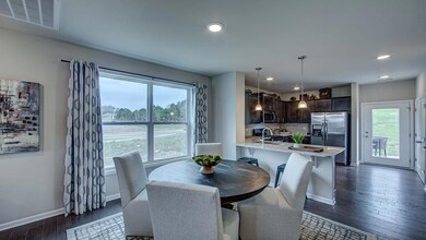 Dining room.  Photo of decorated model home.