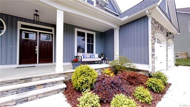 Stunning double door entry. The two car garage off