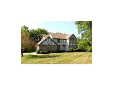 Home sits on a corner lot at the entrance to a cul