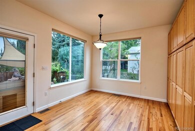 Breakfast area in kitchen and back door to patio