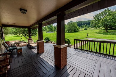 Large covered rear porch to enjoy the view of your