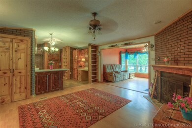 Step inside to a rustic, open floor plan, with a h