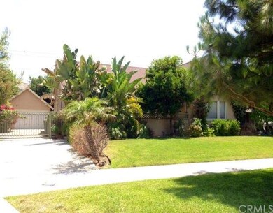 WIDE DRIVEWAY WITH GATE TO BACK YARD AND DETACHED 