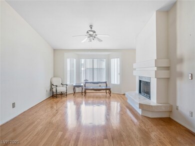 Unfurnished room with ceiling fan, light wood-styl