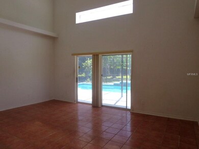 Family Room with Sliding Glass Doors to Screen Enc