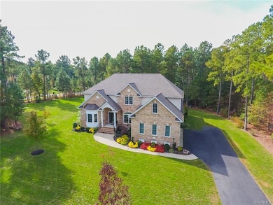 Aerial Front Elevation showing paved drive