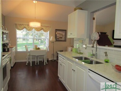 Breakfast area and kitchen OPEN TO LIVING room.