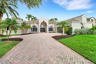 Mediterranean / spanish-style house with a front y