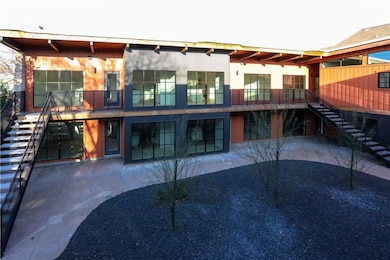 Back of house with stairs