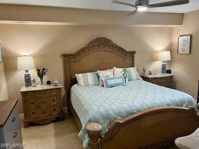 Bedroom featuring a ceiling fan and light tile patterned floors