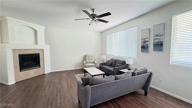 Living room featuring dark wood-style flooring, ce