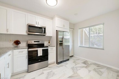 3491 County Barn Rd unit E102, Naples, FL 34112 - photo 3