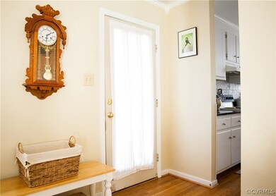 Door to spacious deck & outside storage