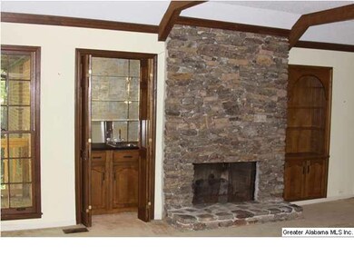 Great Room with fireplace plus a wet bar