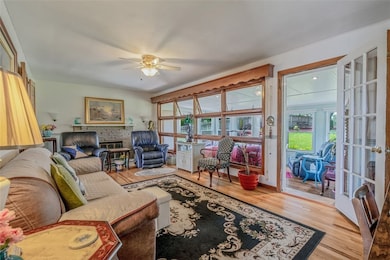 Living Room with Hardwood Floors and Fireplace