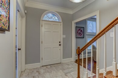 Features custom tile floor and light fixture, crow