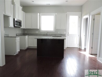 View of a similar kitchen with island to be constr