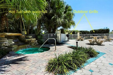 Hot tub with waterfall and grill/picnic ara