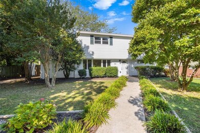 Such Curb Appeal with Established Plantings & Tree