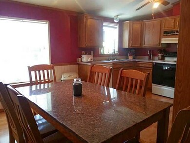 Dining Room Open dining and kitchen area! Bright a