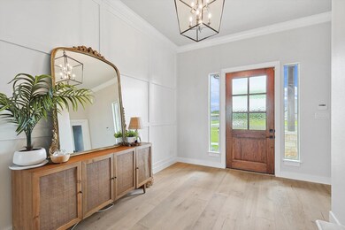 Open foyer leading to office and main living area.