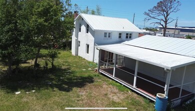Large 24x11 lanai at the rear of the 2 car detached garage!