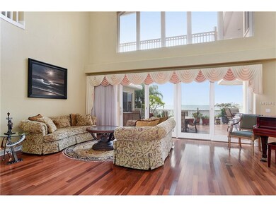 Teak wood flooring in Living Room with MORE bay vi