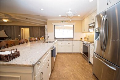 Kitchen with granite counter tops, stainless steel