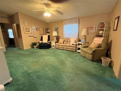 Large living area, Primary suite to the right, and guest bed and bath to the left of the screen