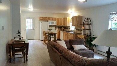 View to side entry and deck.