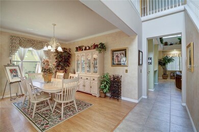 Dining room with hallway into kitchen and family r
