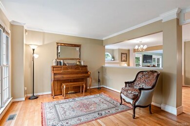 The formal living room graces the front of the hom