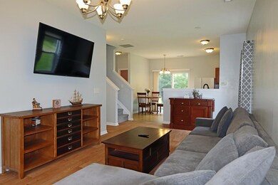 Great Room with wood laminate flooring