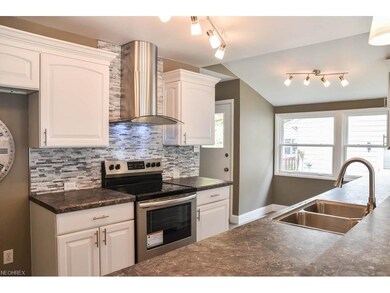 Stunning kitchen with stainless steel appliances.