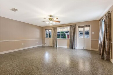 VIEW OF FAMILY ROOM FROM LIVING/KITCHEN AREA.  FRE