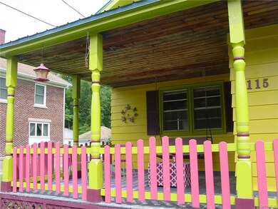 Sit on this adorable porch and watch the world go 