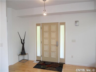 Other. Front foyer. Powder room is to the left.
