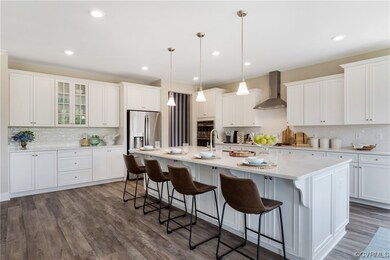 Builder images of a previously built decorated model, finishes, available options and layout can differ in actual home