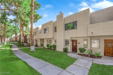Multi unit property featuring stucco siding, a fro