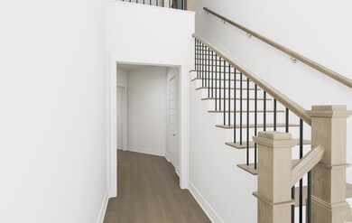 Staircase with hardwood / wood-style floors